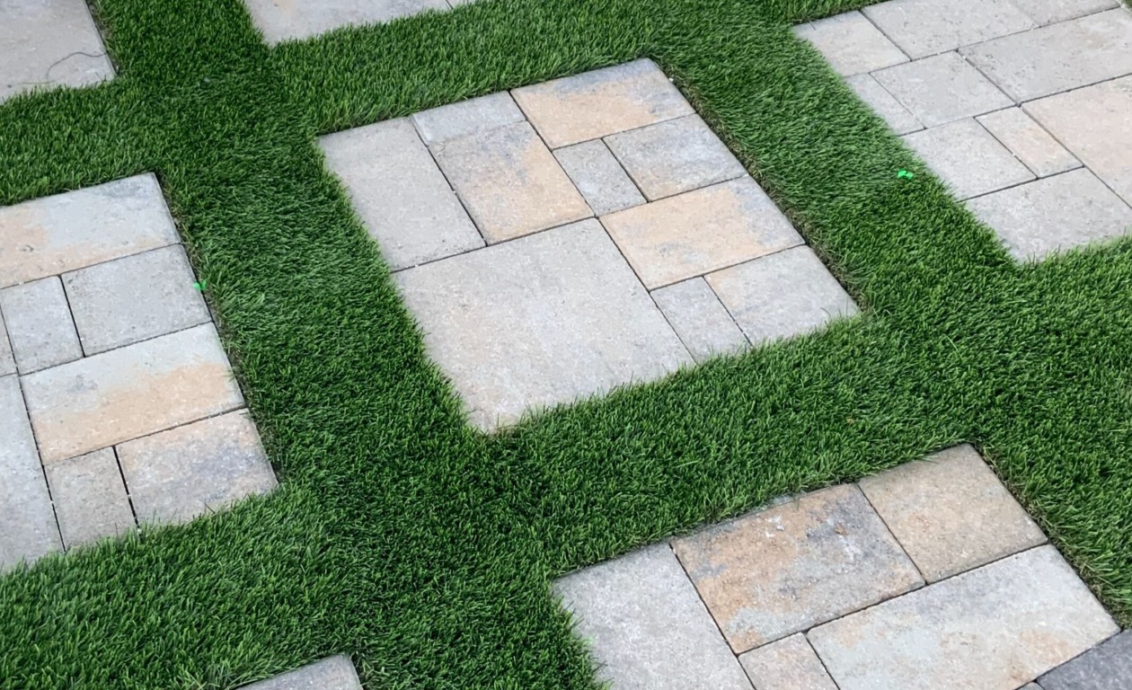Creative paver and turf installation design in Palm Coast