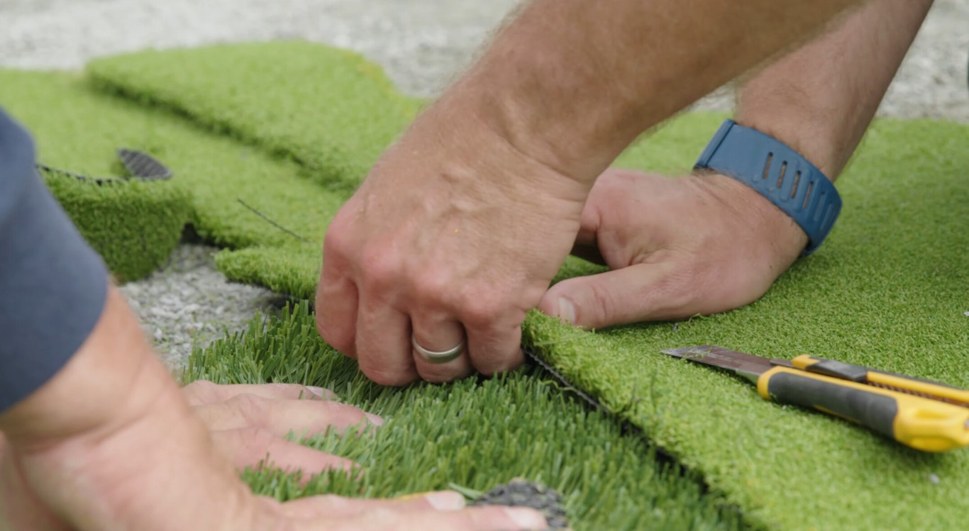 Professional artificial turf installation process for safety surfaces