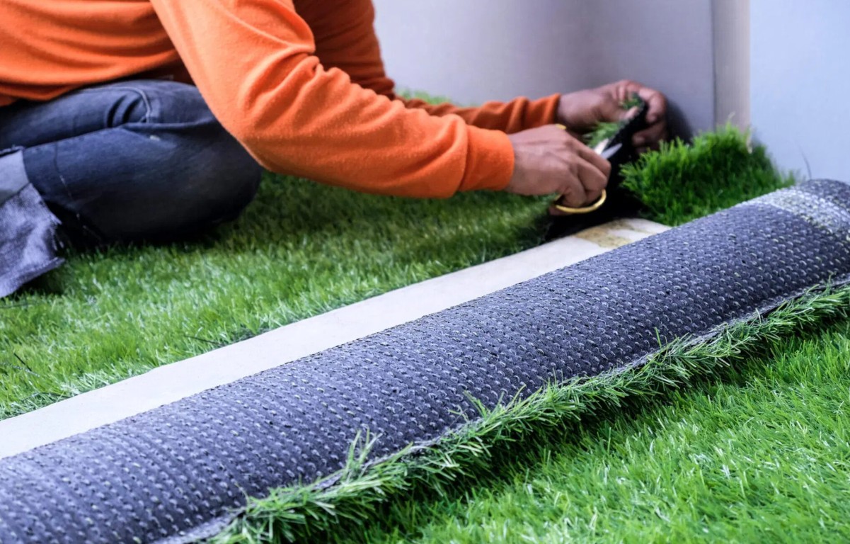 Pet-friendly artificial grass installation with drainage system in Palm Coast